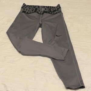 Nike Dri Fit 3/4 length crossover waistband legging